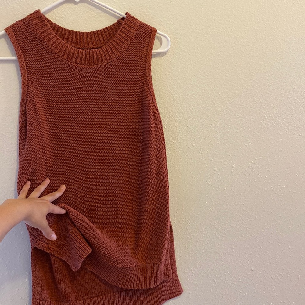 Fits as a S, sizing is XXS